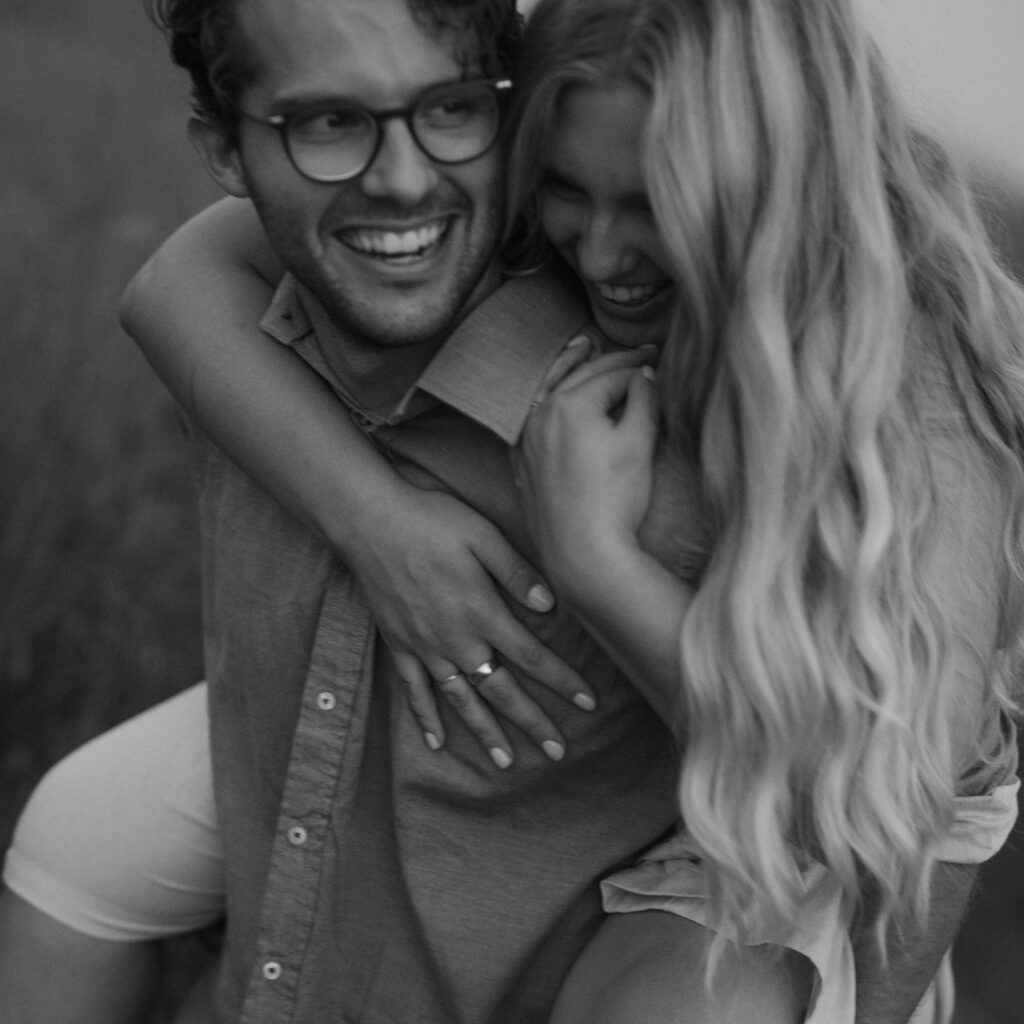 Couple embraces at blue hour engagement photos in Afton.